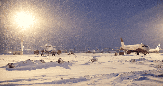 Blog Header Two grounded airplanes in the snow